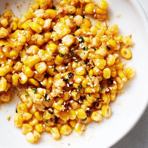 Golden Japanese butter corn, glistening with soy sauce, ready to serve as a flavorful side.
