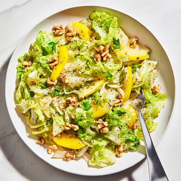 Sautéed cabbage and apples stir fry with a hint of Dijon mustard.  