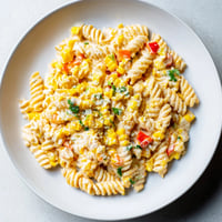 Creamy One-Pot Mexican Street Corn Pasta, topped with fresh cilantro and cotija.